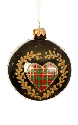 Decorative Christmas ornament with a heart-shaped plaid design on a black background.