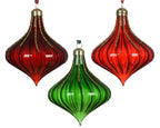 onion glass bauble with transparent finish and velvet hanger in two shades of  red and one shade of green