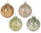 Four glass Christmas ornaments with leaf patterns on a white background