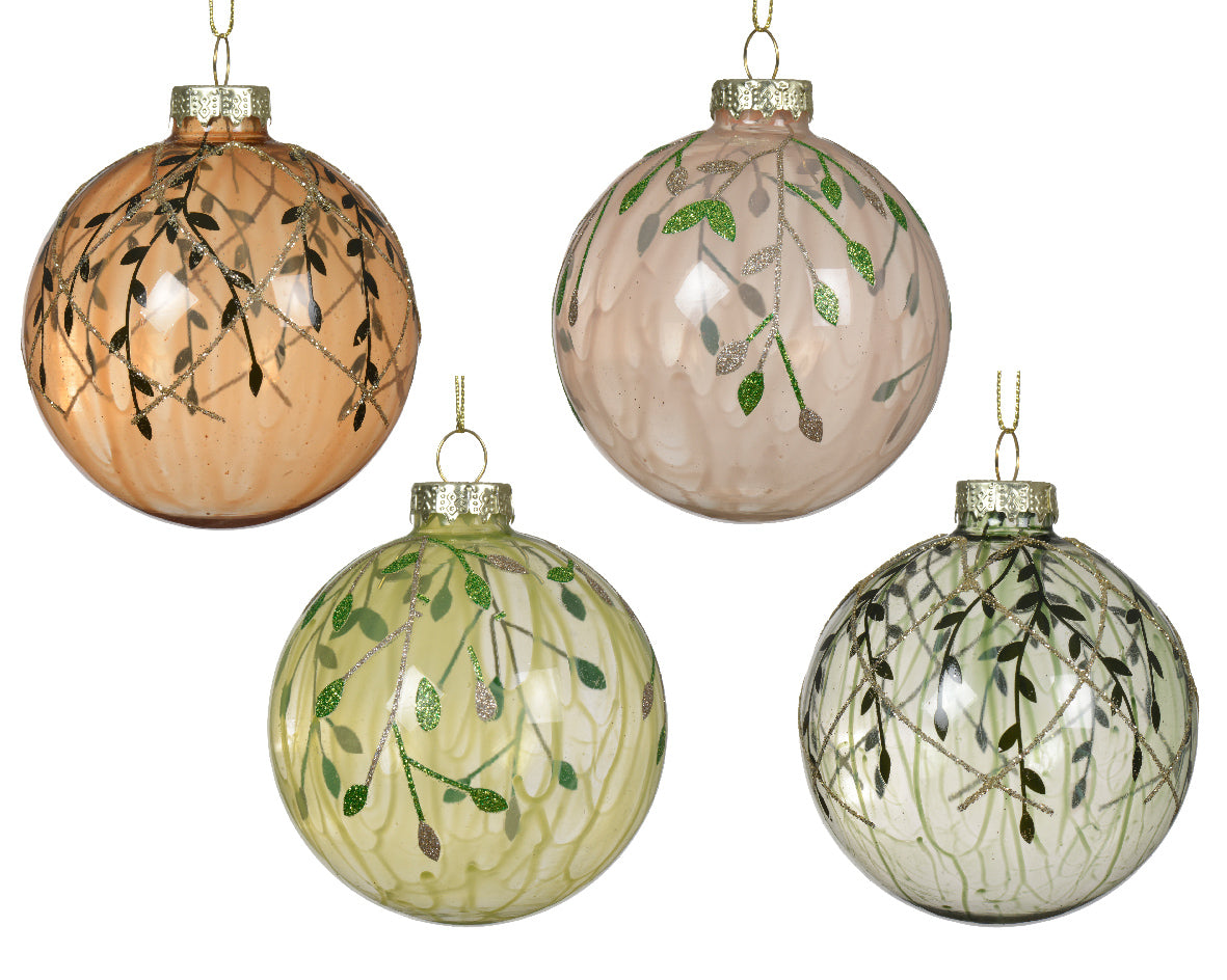 Four glass Christmas ornaments with leaf patterns on a white background