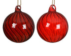 Clear glass Christmas bauble with swirl pattern and jute rope hanger, available in assorted colours