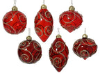 Set of red Christmas ornaments with gold accents on a white background