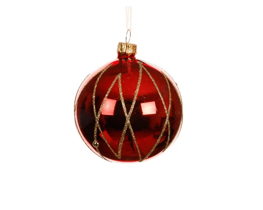 Red Christmas ball ornament with gold criss-cross pattern on a white background