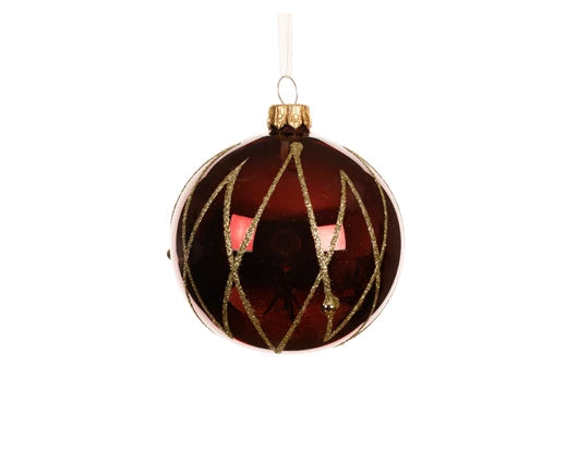 Decorative Christmas ball ornament with gold accents on a white background