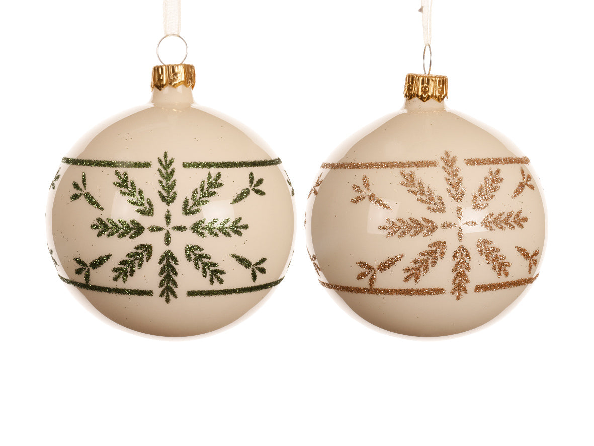 Two beige Christmas ornaments with green and gold patterns on a white background