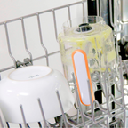 Dishwasher rack with a blender and a white plate inside