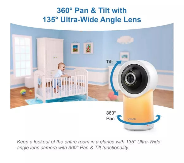 Vtech baby monitor camera shown in a nursery room scene with a baby crib and text explaining 360° pan and tilt with a 135° ultra-wide angle lens.