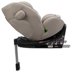 Osann One 360 SL i-Size Car Seat in Wheat in a light taupe-beige fabric, shown from a side-rear angle on a black base with a silver support leg, isolated on a white background.