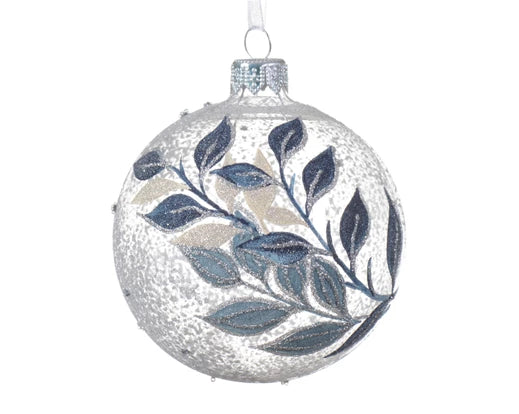Decorative glass ball ornament with leaf pattern on a white background