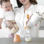 Person using a baby bottle warmer with a baby sitting next to them