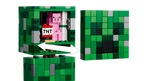LEGO Minecraft set with a pig and TNT block on a green block background
