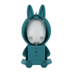 A teal bunny-shaped wall lamp with upright ears, a frosted oval light panel, and small wheels at the base, shown on a plain white background.