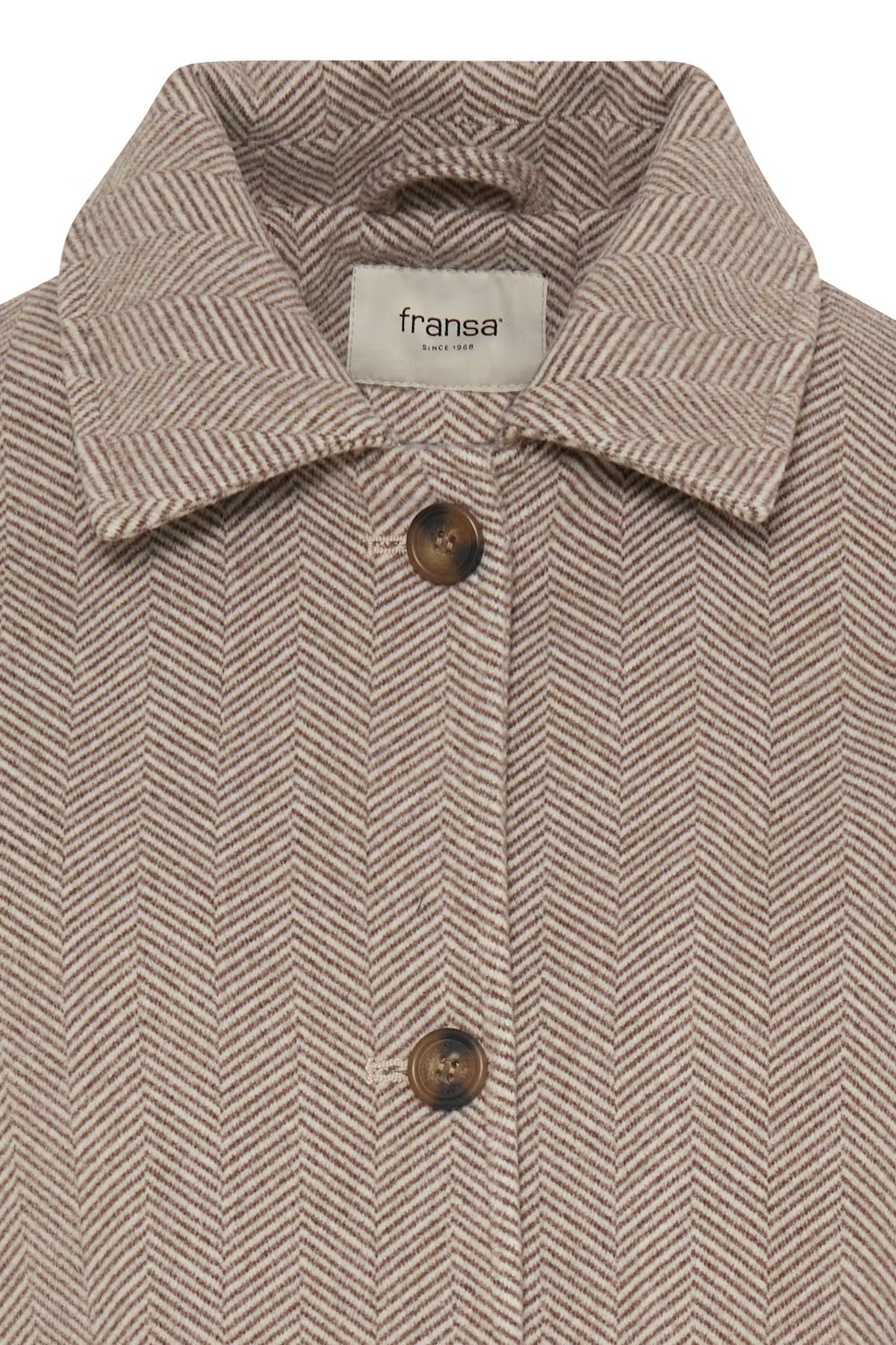 Close-up of a Fransa London herringbone patterned jacket in beige and brown, featuring a pointed collar and dark brown buttons.