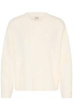 An Whisper White pullover with a subtle tonal floral pattern, displayed against a solid white background.