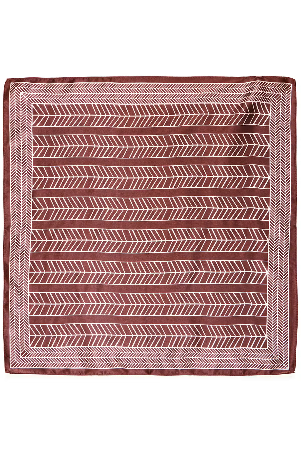 A square Rum Raisin  scarf with a geometric pattern, featuring a rust red background with white chevron and herringbone motifs, displayed flat against a white background.