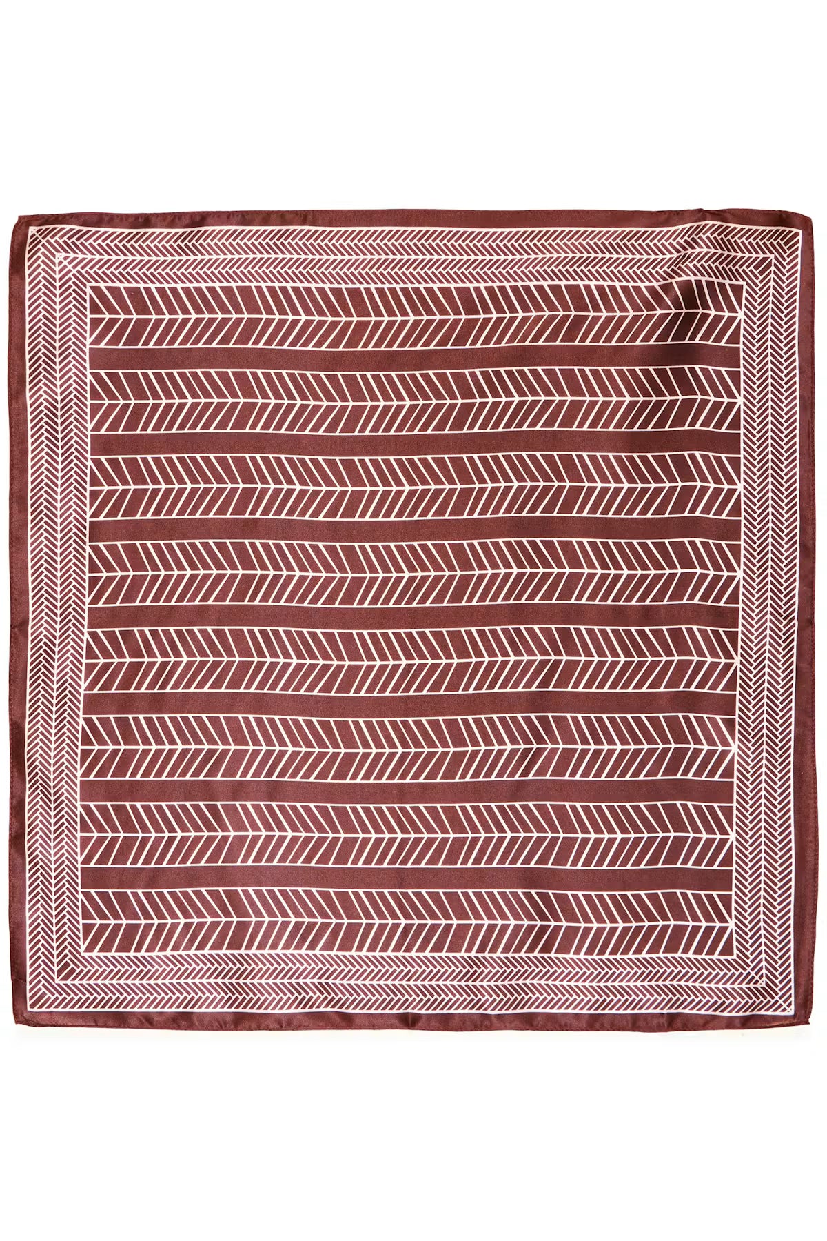 A square Rum Raisin  scarf with a geometric pattern, featuring a rust red background with white chevron and herringbone motifs, displayed flat against a white background.