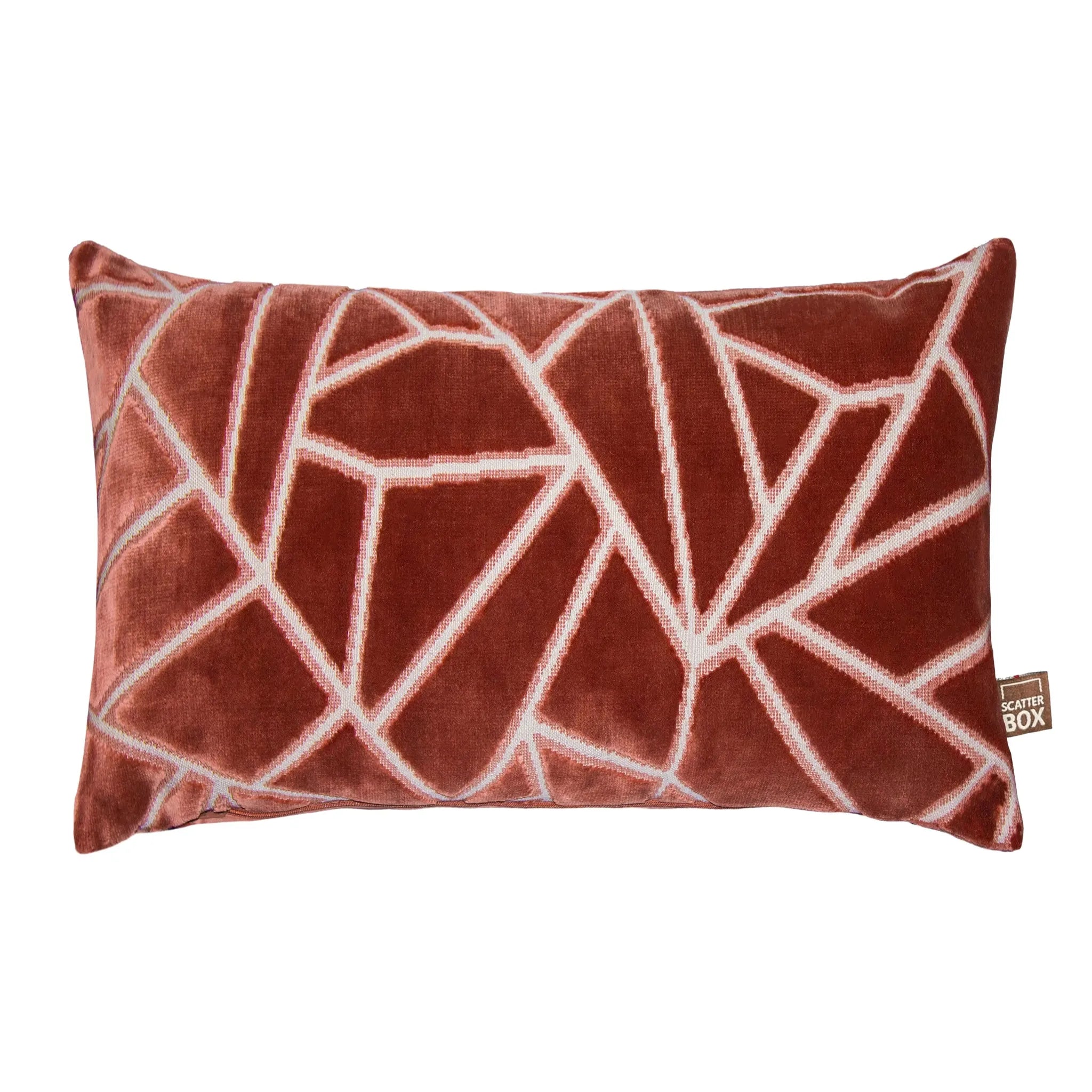 A rectangular Veda Cushion in Antique Rosein a rust red color with a white geometric line pattern, shown on a plain white background. A small fabric tag on the bottom right reads 'Comfort 80X'.