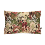 A rectangular decorative Merida Cushion in Green featuring a dense, textured botanical tapestry pattern with green, red, beige, and brown leaves and flowers, shown against a plain white background.