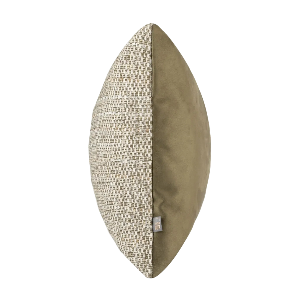 A single oval Preston Cushion in Greenshown against a plain white background, featuring a textured beige and brown woven pattern on one half and a smooth olive green fabric on the other.