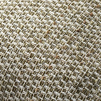 Close-up of a woven Preston Cushion in Green with a basketweave pattern in beige, brown, and off-white threads.