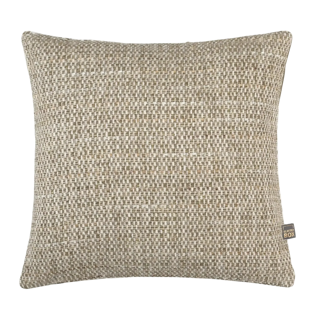 A square woven tPreston Cushion in Greenin a textured beige and off-white bouclé fabric, featuring a small woven brand tag on the bottom right corner.