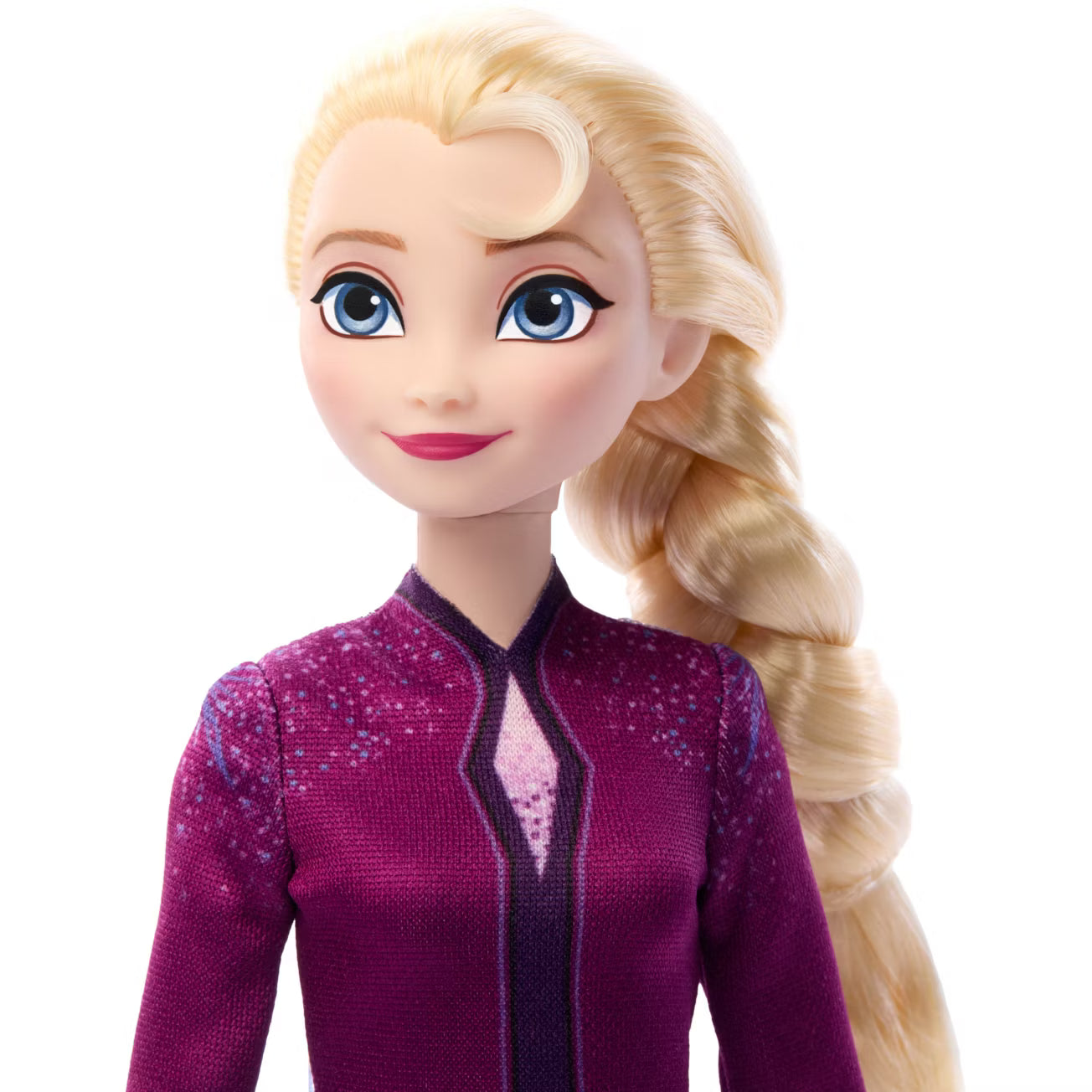 Toy doll with blonde hair and a purple outfit on a white background