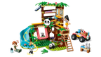 LEGO set with panda-themed play structure, vehicles, and figures on a white background
