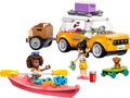 LEGO set with a yellow car, pink boat, and two dolls on a white background