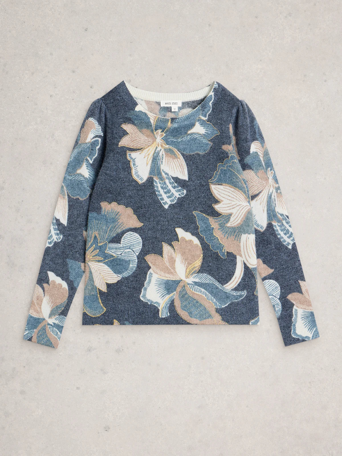 Floral patterned sweater on a light gray background