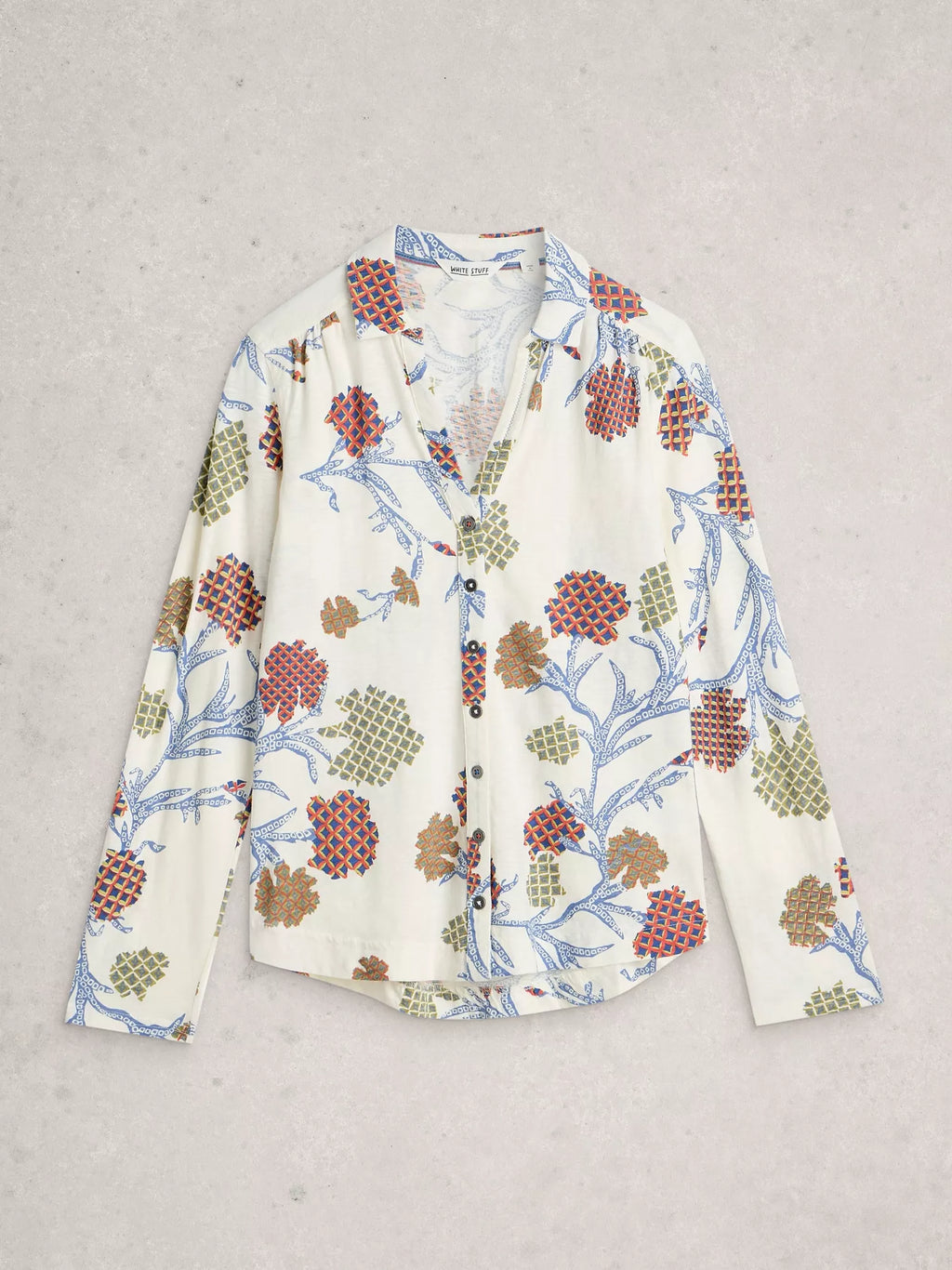 Floral patterned shirt on a light gray background