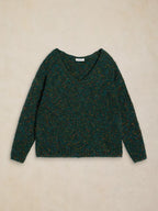 A dark green marled knit sweater with a wide V-neck and long sleeves, laid flat on a textured beige background.