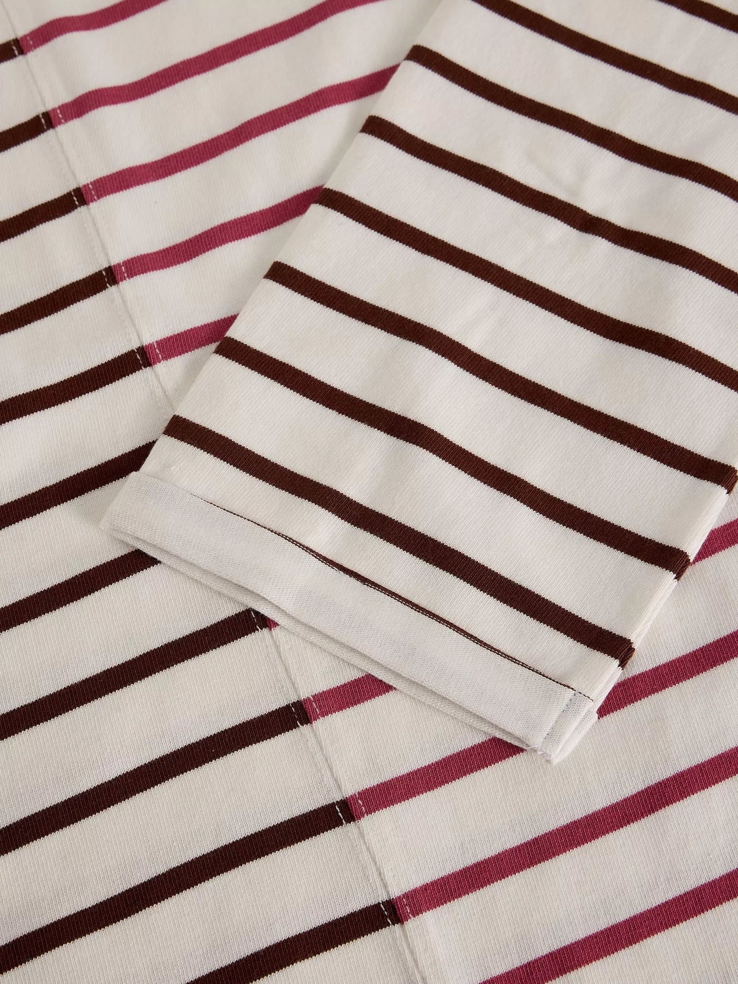 Kim Stripe Long Sleeve Tee flat zoomed on hand lay in Ivory Multi 
