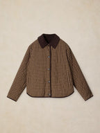 A brown and beige checkered quilted jacket with a solid dark brown collar, laid flat on a textured beige background.