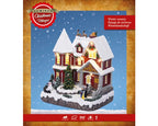 Lumineo LED Christmas village scene with music, movement, and warm white lights – 23.5 cm indoor decoration, battery powered
