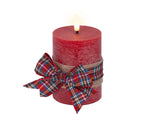 Rustic LED wick candle with red check bow, warm white light, 13 cm tall, battery operated with timer, festive indoor décor