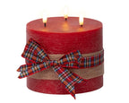 Rustic red LED candle with check bow and warm white flame effect, 15cm