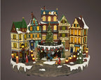 Lumineo large LED Christmas village scene with music, 48 warm white lights, movement, indoor plug-in décor, 31.5 cm high