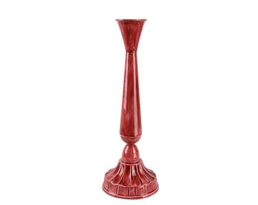 Red candle holder on a white background