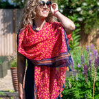 Red and orange leaf print cotton scarf with stripes and tassels - Flemings Department Store