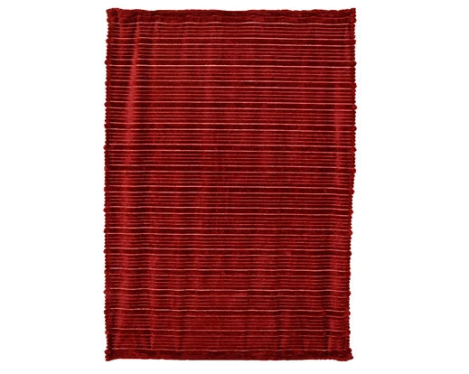 Red textured rug on a white background