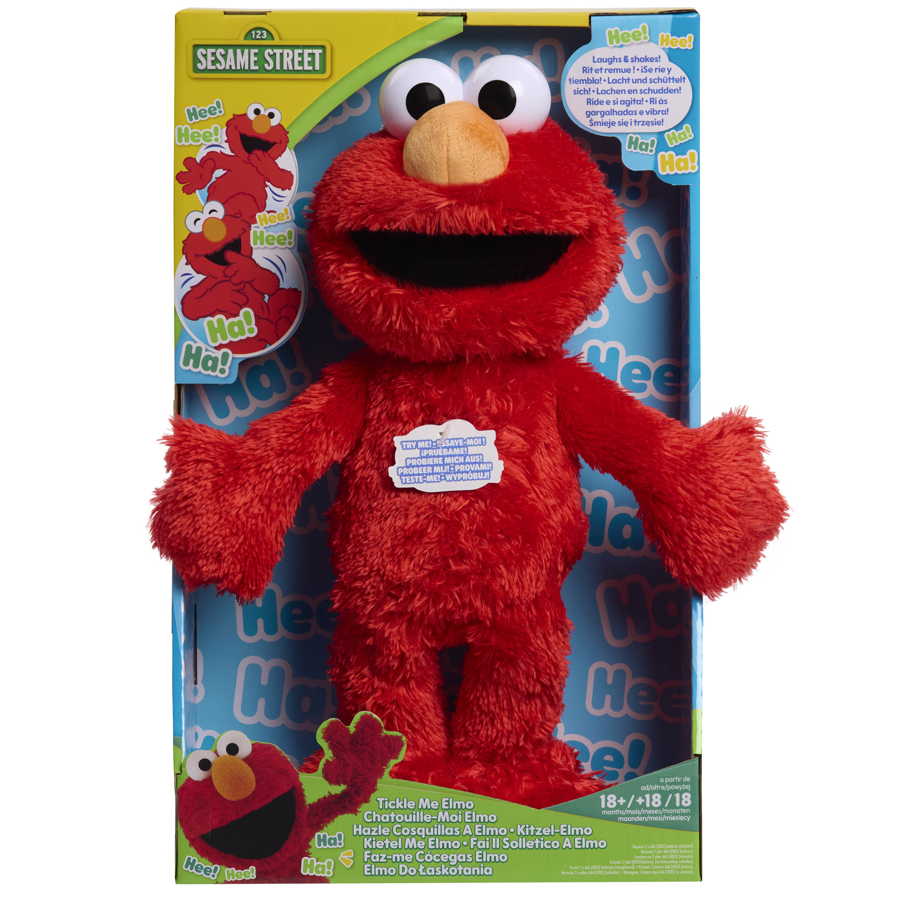 Red Sesame Street Elmo plush toy in packaging