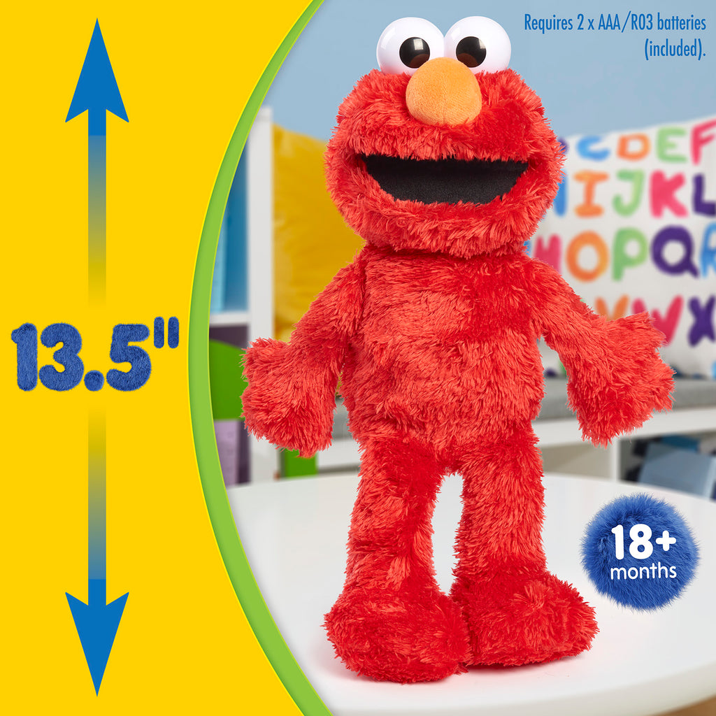 Sesame Street Tickle Me Elmo interactive plush toy laughing with a height of 13.5