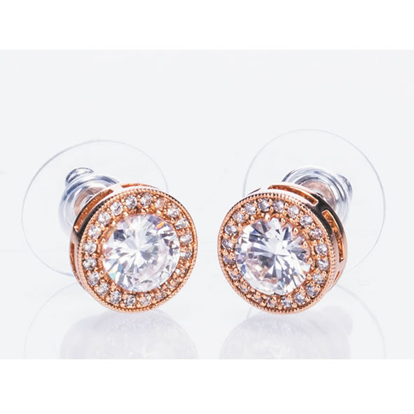 A pair of rose gold earrings featuring white stones and diamante detailing, presented against a white background.
