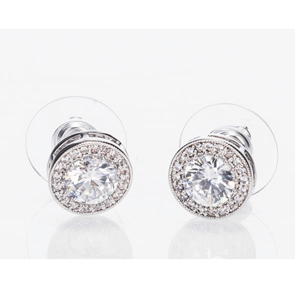 A pair of silver earrings featuring white stones and diamante accents, presented against a white background.
