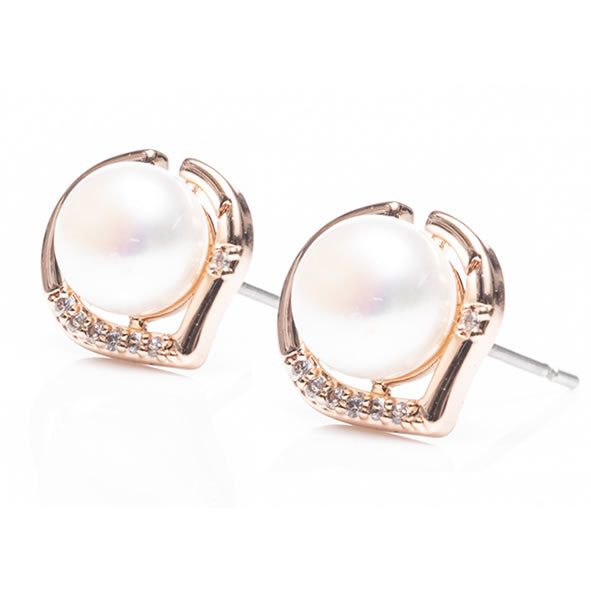 Newgrange Living rose gold earrings with mother of pearl inlay, gift box included
