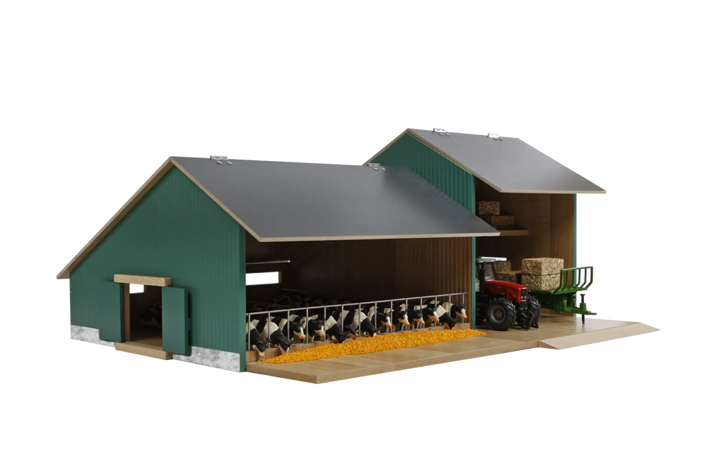 Model farm with barn, tractor, and animals on a white background