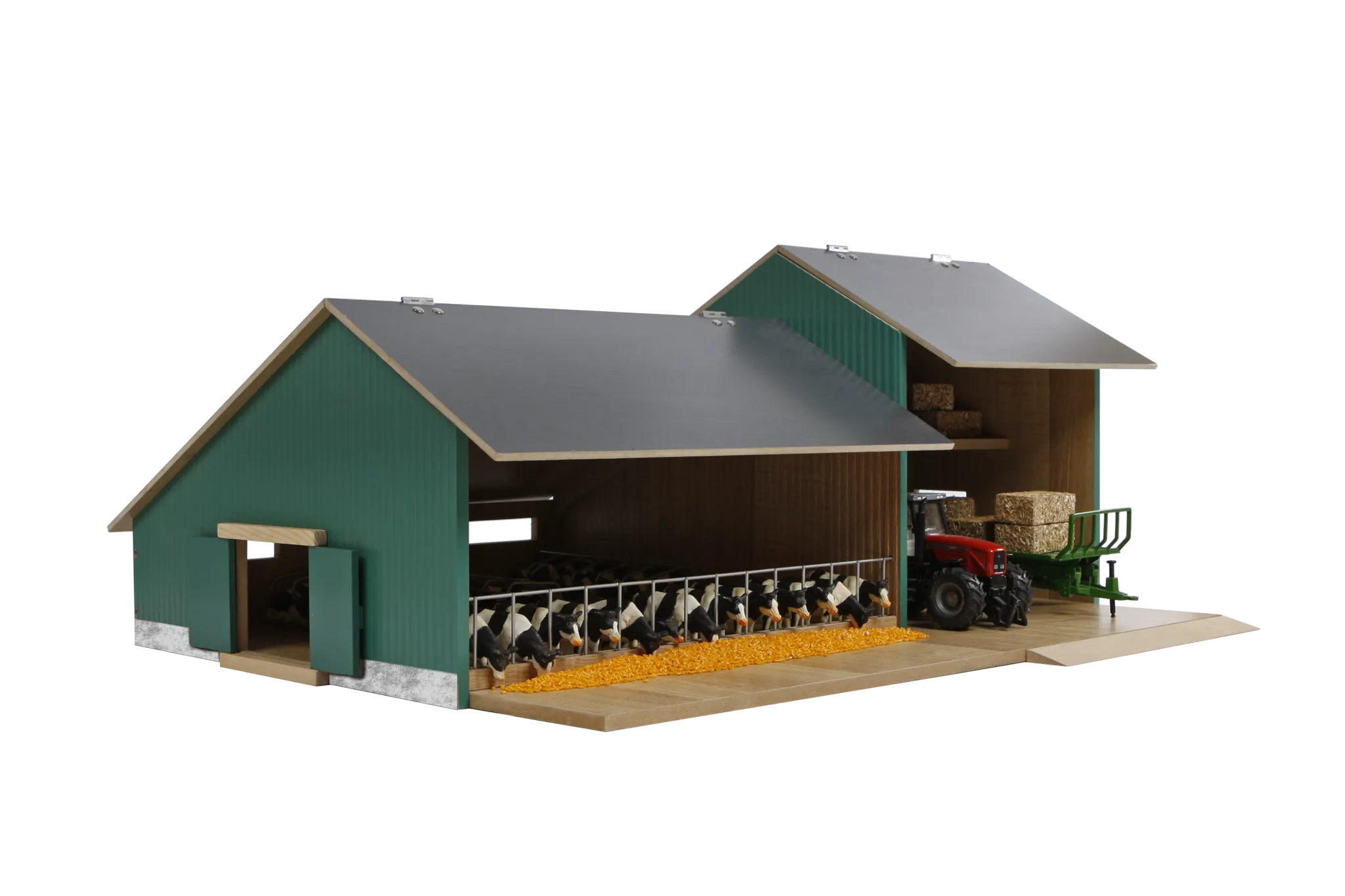 Model farm with barn, tractor, and animals on a white background