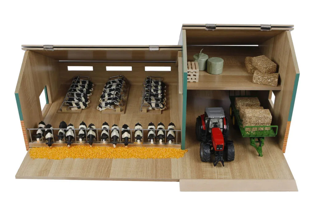 Model farm with animals and a tractor inside a wooden shed