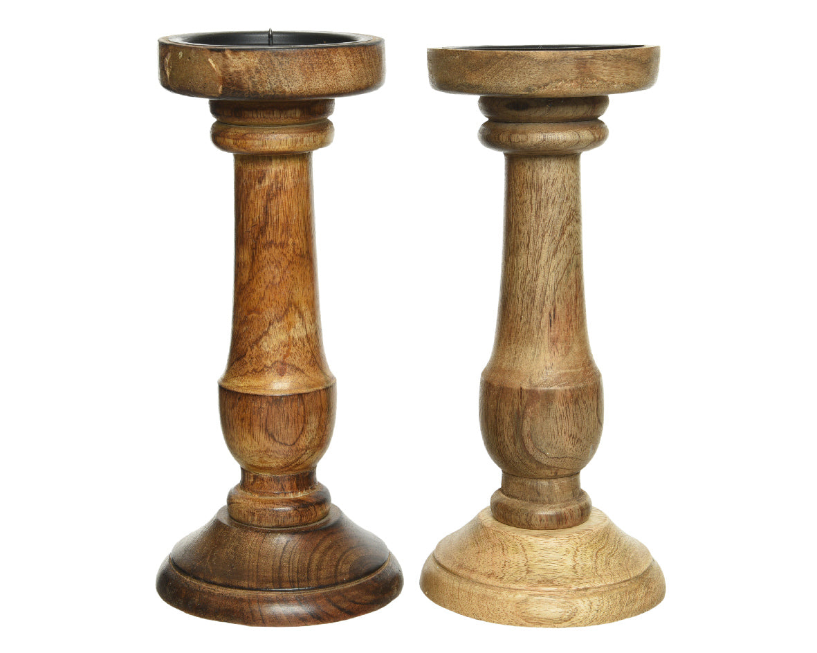 Two wooden candle holders on a white background