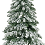 Snow‑tipped Tora Pine artificial Christmas tree (6 -7ft), realistic PVC needles with snowy finish, perfect for festive décor.